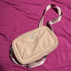 Lululemon light pink convertible cross body.